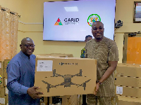 One of the beneficiaries receiving the drone