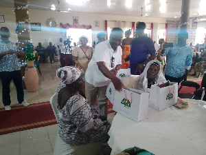 Armah-Kofi Buah distributing food items to the aged in Ellembelle
