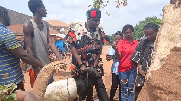 The ritual performance follows a bizarre incident of bees terrorizing residents