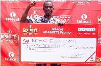 Kennedy Boakye from Nkoranza receives the weekly cash prize of GH¢20,000 in the Telecel Mahiti promo