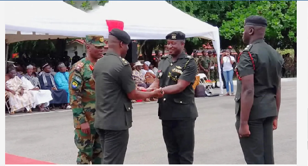 Lt. Col. Edward Appiah (Left) during the pull out service