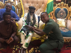 Cedric Dzelu greeting the Chief Imam