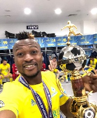 Patrick Twumasi celebrates victory
