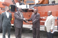 Pasico MD (2nd From L) presenting the keys to the Reachstackers Deputy Chief Executive COCOBOD