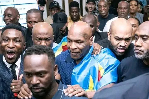 Tyson (with the Congo flag) paid a visit to Congo