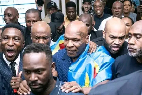 Tyson (with the Congo flag) paid a visit to Congo
