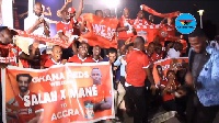 Liverpool fans in Ghana jubilate before the start of CAF Awards in Accra