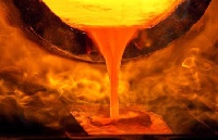 Melted gold being poured from hot  furnace.    File photo.