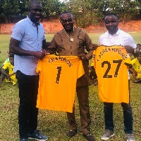 Wolverhampton Wanderers official Seyi Olofinjana and AshantiGold's Dr Kwaku Frimpong and CEO Frederi