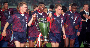 George (first from right) win di 1994-95 Uefa Champions League wit Dutch club Ajax
