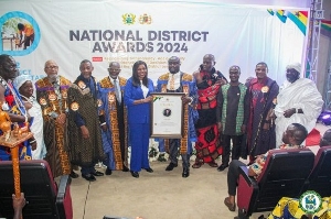 Elizabeth K.T. Sackey receiving her award at the event