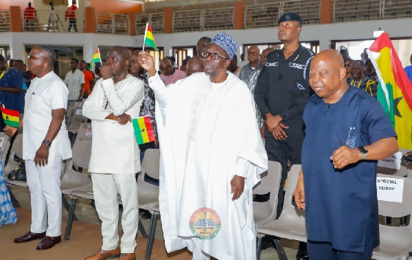 Speaker Bagbin with the minature flag raised high