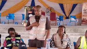CEO of the NPA, Edudzi Tameklo ((standing) speaking at the engagement with the people