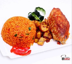 A rich orange-red delicacy made from rice and a spicy stew mixing tomato, onions, meat or fish