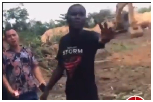 A youth at Akoase confronting a Chinese national