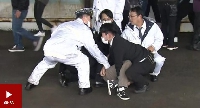 Video appear to show moment police gada Japan smoke-bomb suspect