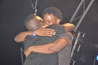 MI Abaga in an embrace with his biggest fan Archie