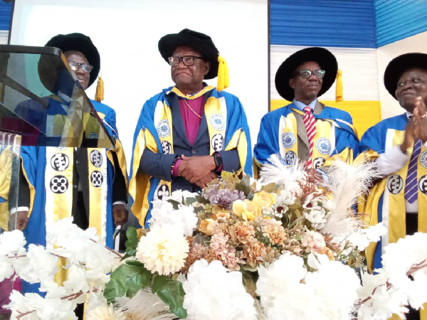 Professor Emmanuel Asante being invested