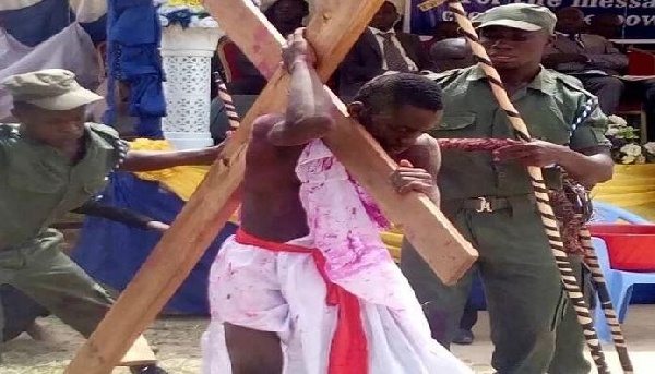 District Chief Executive of Birim South, Richmond Amponsah Adjabeng carrying the cross of Jesus