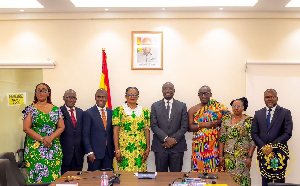 Minister of Finance, Dr Cassiel Ato Forson in a pose with members of the SSNIT board