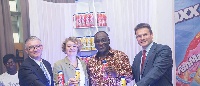 Trade Minister,Alan Kyeremanten in a group photograph with officials from Fan Milk Ghana