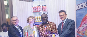Trade Minister,Alan Kyeremanten in a group photograph with officials from Fan Milk Ghana