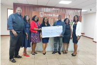 Mawuko Afadzinu (3rd from right) presenting the cheque to HOPSA 99 Executives