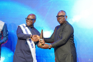 Managing Director of Labadi Beach Hotel , David Eduarful (left) receiving the award