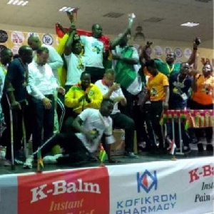 Officials and players of Ghana Armwrestling celebrating their victory