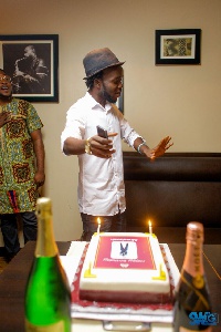 Akwaboah before cutting his cake.