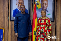 Energy minister (L) with UNIDO official )R) in his office