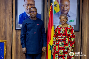 Energy minister (L) with UNIDO official )R) in his office