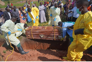 Relatives weep as they attend the burial of Neema Minaro, a 66 year old woman who died of ebola Relatives weep as they attend the burial of Neema Minaro, a 66 year old woman who died of ebola