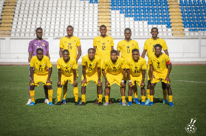 Black Starlets pose for a picture after a football match