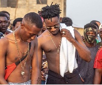 Dancehall artiste, J. Derobie with Mr. Eazi in his 'Poverty' music video