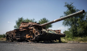 The charred remains of a T-72 tank on a road that connects Shiraro to Shire on October 12, 2024
