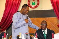 NAGRAT President Mr. Carbonu [seated], with the Minister for Education, Matthew Opoku Prempeh