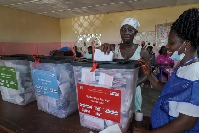 Woman casts her vote during Liberia's presidential election in Monrovia, Liberia, October 10, 2023