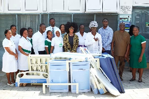 Kojo Antwi (in a scarf), donated to the hospital on his birthday