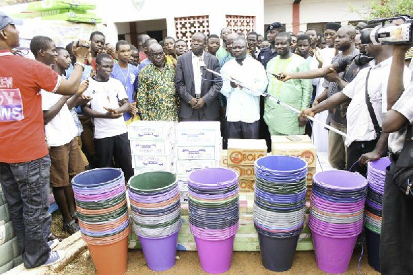 Northern Regional Minister Salifu Sa-eed in the company of some school officials and students