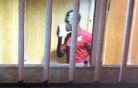Former Black Stars defender John Boye kissing his money after it arrived in Brazil