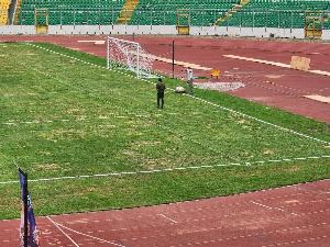 An image displaying the state of the Baba Yara Stadium pitch during the Dmeocracy Cup  game