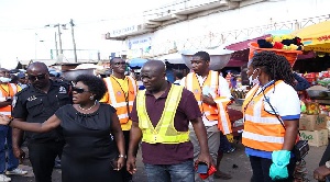 AMA and Zoomlion officials in Agbogbloshie