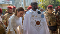 Guinea's President, Gen. Mamadi Doumbouya, arrives with his wife