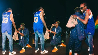 Shatta Wale kneeling before his 'idol', Vybz Kartel on stage