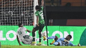 Cameroon defender Oumar Gonzalez could not keep out Ademola Lookman's first-half effort for Nigeria