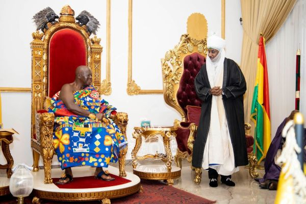 Otumfuo Osei Tutu II, Asantehene (Seated) with a guest at Manhyia Palace