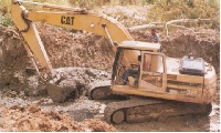 A bulldozer at a mining site in Ghana