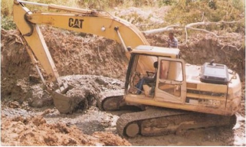 A bulldozer at a mining site in Ghana