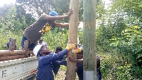 ECG offcials mounting a pole